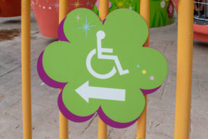 Wheelchair access sign in theme park